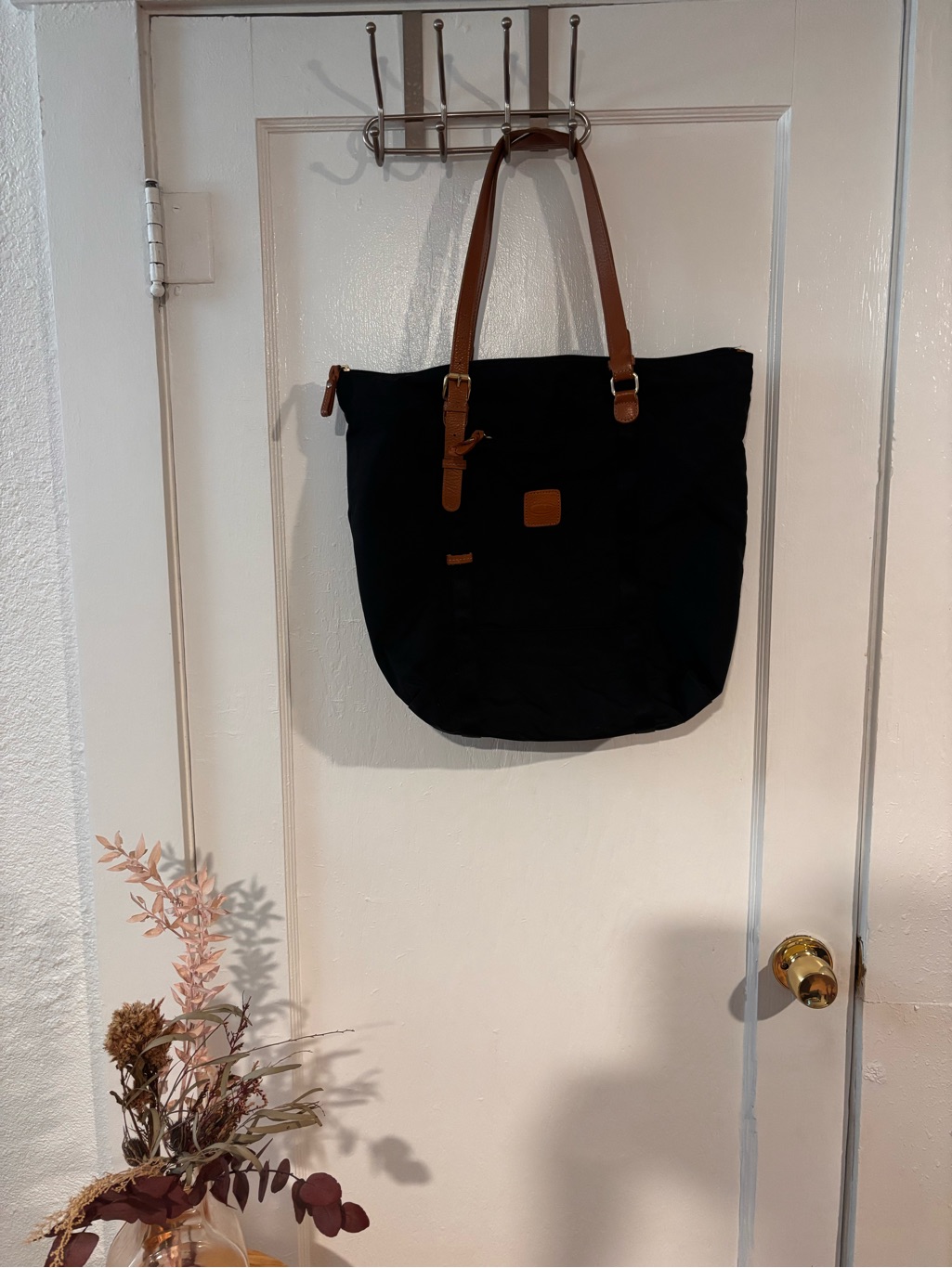 Bricâs Black Tote With Brown Leather Handles